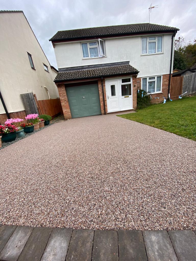 In the event of any heavy loads being placed onto your resin bound driveway, always use wooden planks beneath to spread the load and prevent the weight from damaging the surface.